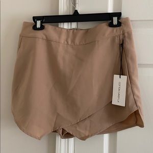 Tan skort